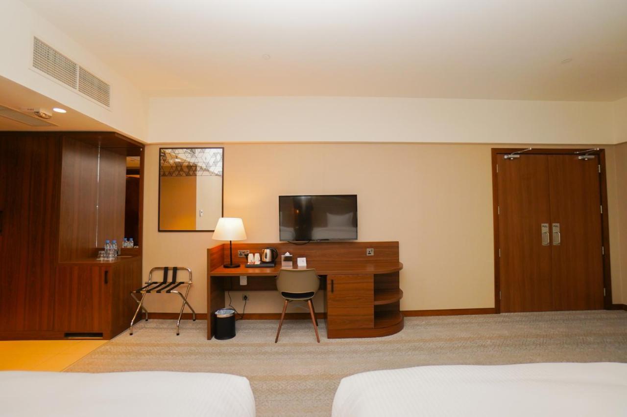 The Grand Lux Hotel Ad-Dauha Zewnętrze zdjęcie A room at the hotel