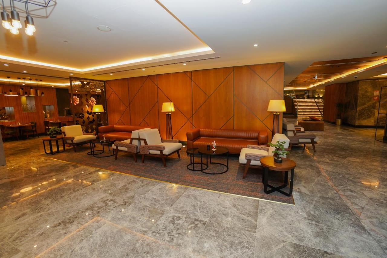 The Grand Lux Hotel Ad-Dauha Zewnętrze zdjęcie The lobby of the hotel