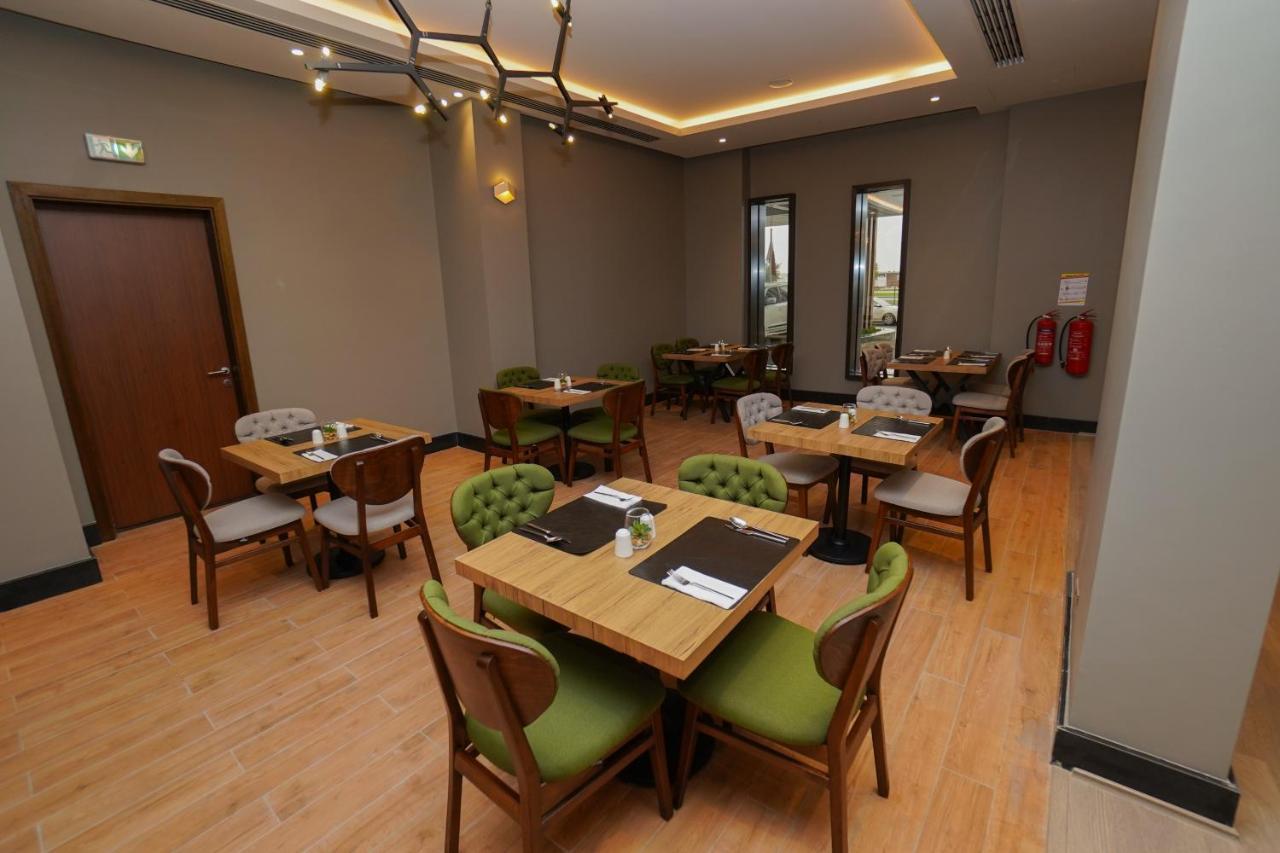The Grand Lux Hotel Ad-Dauha Zewnętrze zdjęcie The restaurant