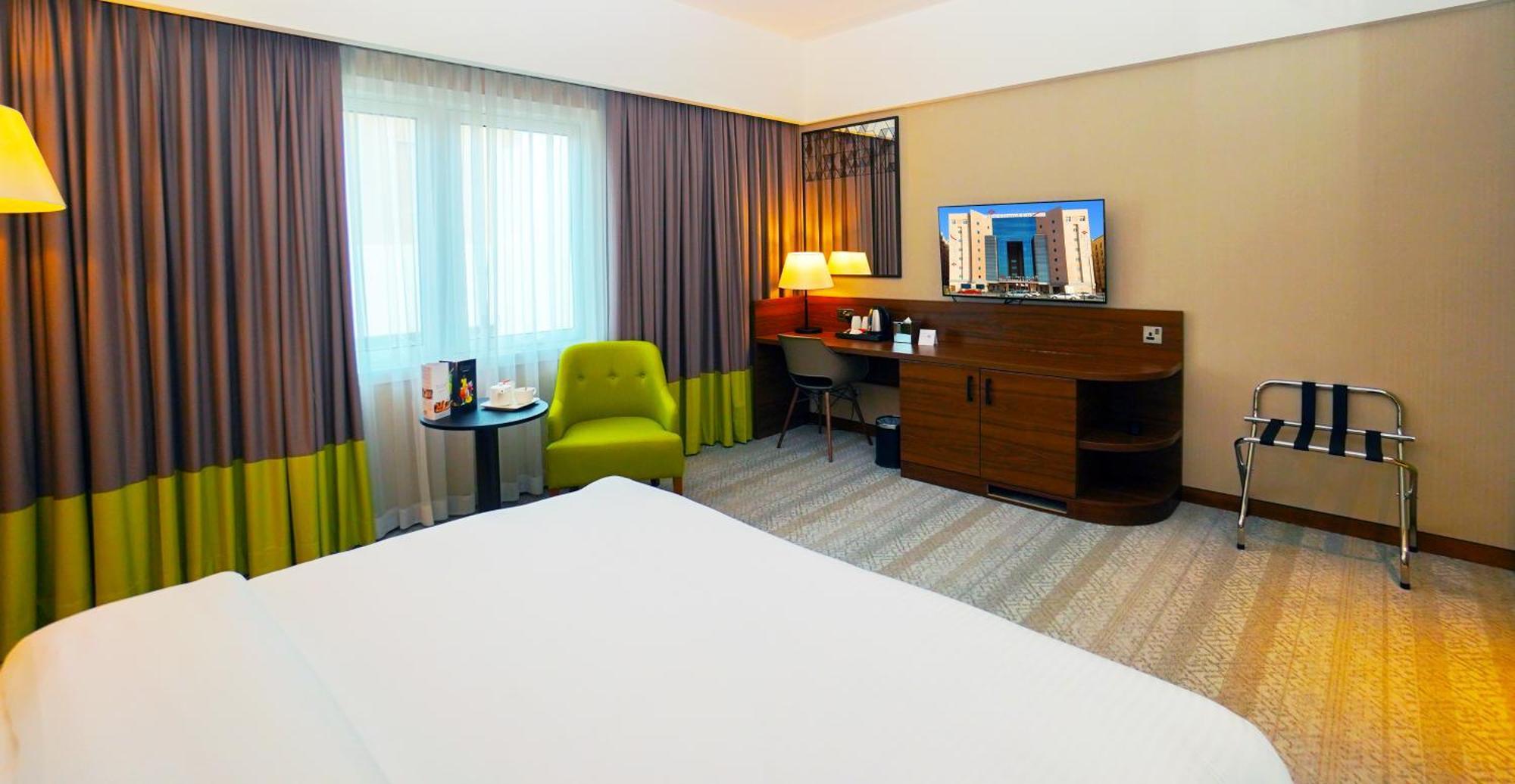 The Grand Lux Hotel Ad-Dauha Zewnętrze zdjęcie A room at the hotel